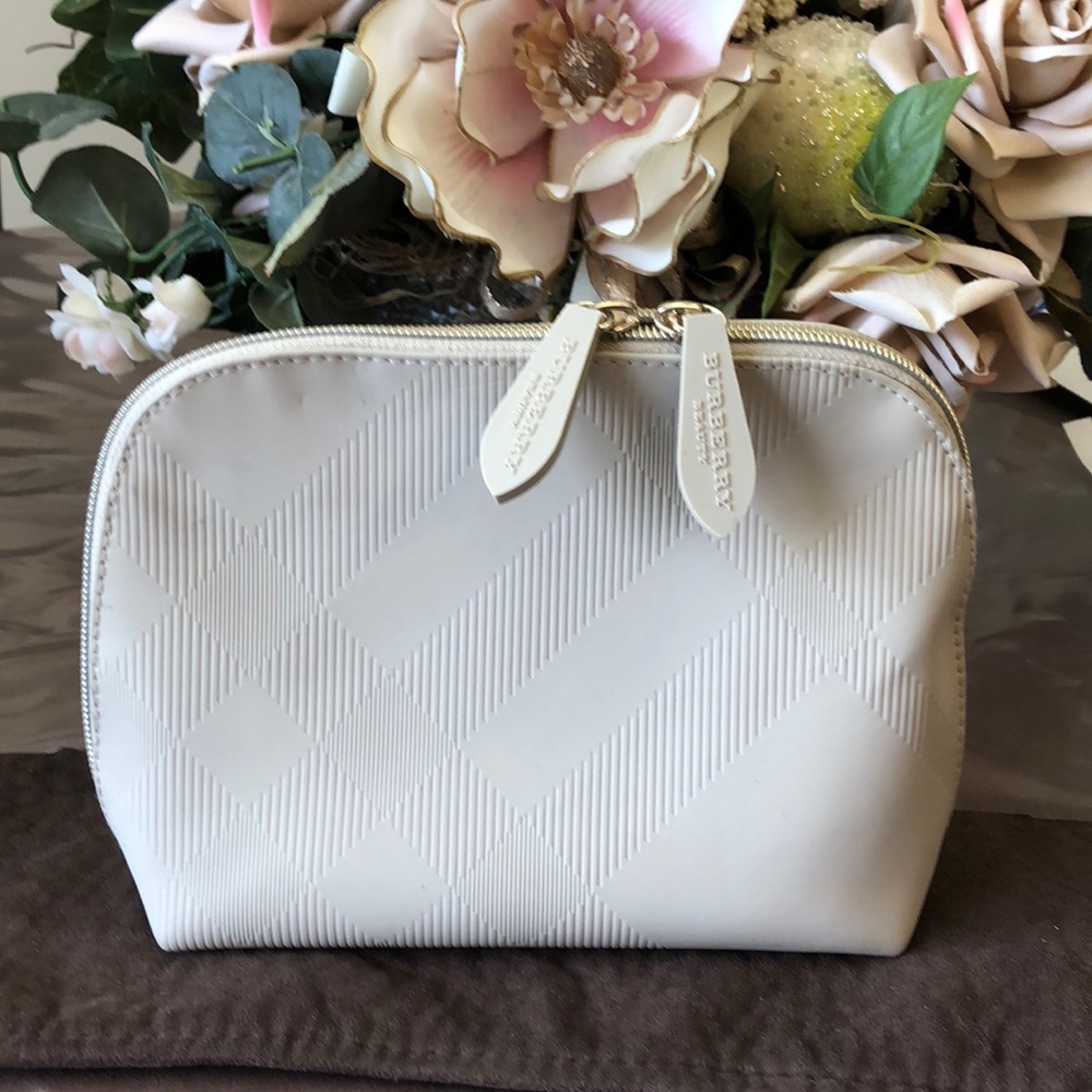 A Sleek BURBERRY Cosmetic bag
